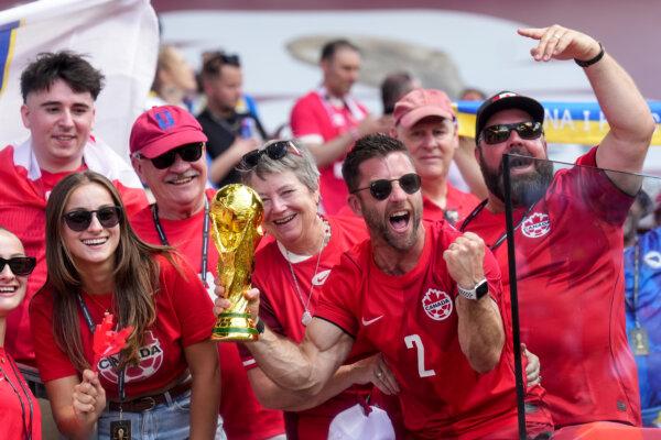 Canadian fans cheer before Canada and Bosnia-Herzegovina play a World Cup Group B soccer match, in Toronto, on June 12, 2026. (The Canadian Press/Nathan Denette)