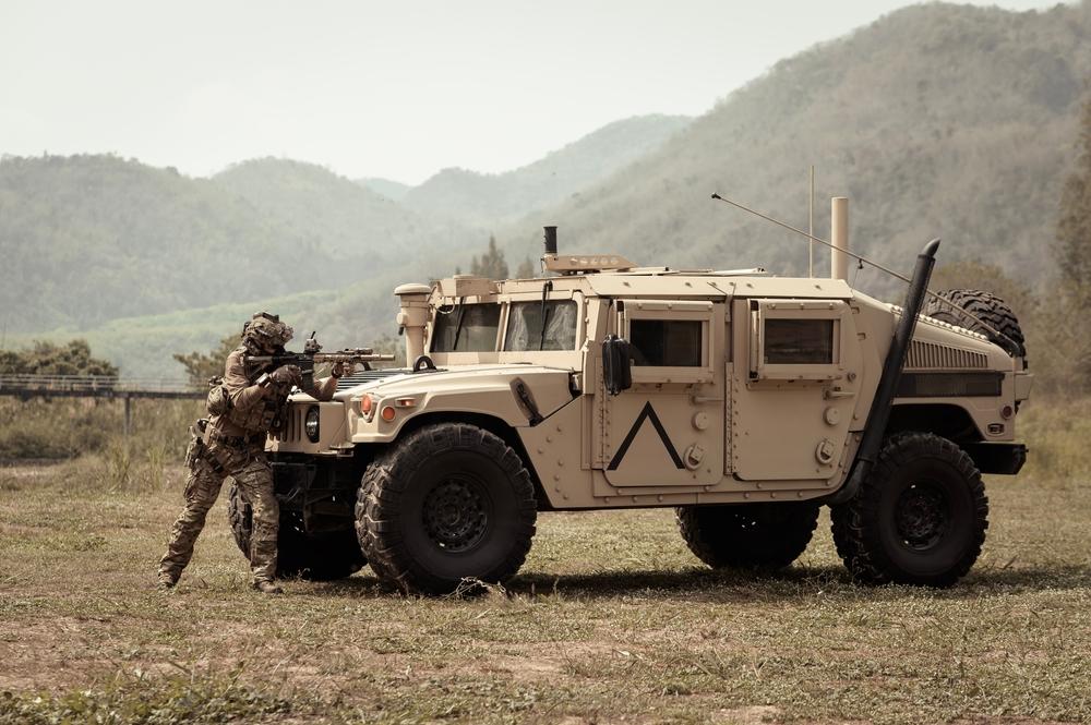 An army Humvee is destroyed in a firefight in this thriller. (Thanakorn.P/Shutterstock)