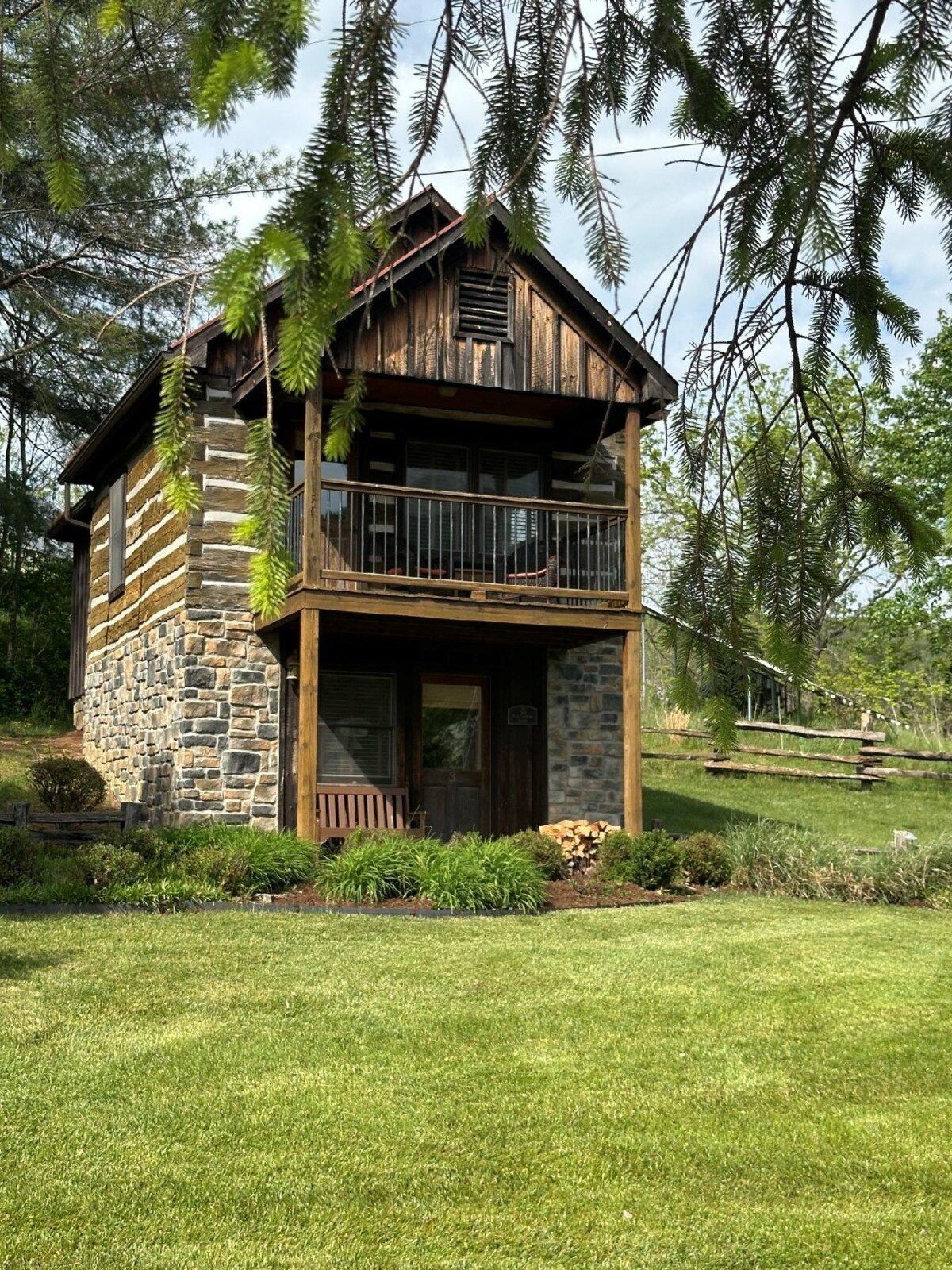 Tall Timbers is one of the historic cabins where guests can stay at the Fort Lewis Lodge and Farm in Millboro, Va. (Candyce H. Stapen)