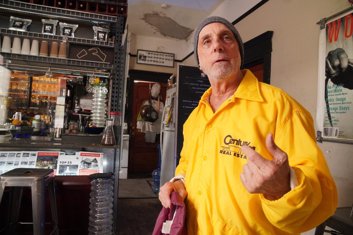 Tenant Barry Schwartz stands in the living room of the Louis Emerson House in Phoenix on June 13, 2026. (Allan Stein/The Epoch Times)