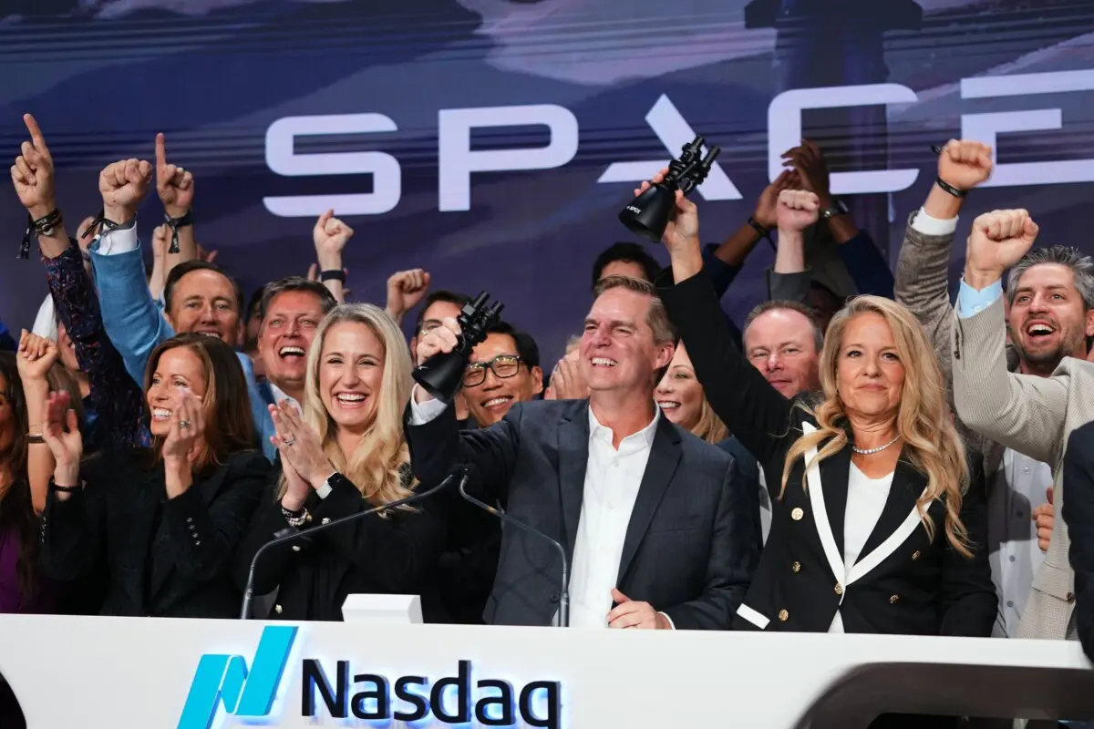 Gwynne Shotwell, president and COO of SpaceX (R) celebrates with colleagues during a bell ringing ceremony for the IPO of SpaceX at the Nasdaq MarketSite in New York on June 12, 2026. (Frank Franklin II/AP Photo)