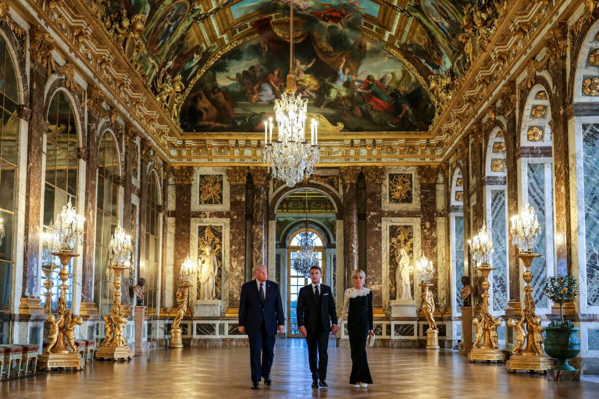U.S. President Donald Trump (L) receives a tour of the Palace of Versailles from French President Emmanuel Macron and his wife, Brigitte Macron, ahead of a dinner in Versailles, France, on June 17, 2026. (Anna Moneymaker/Getty Images)