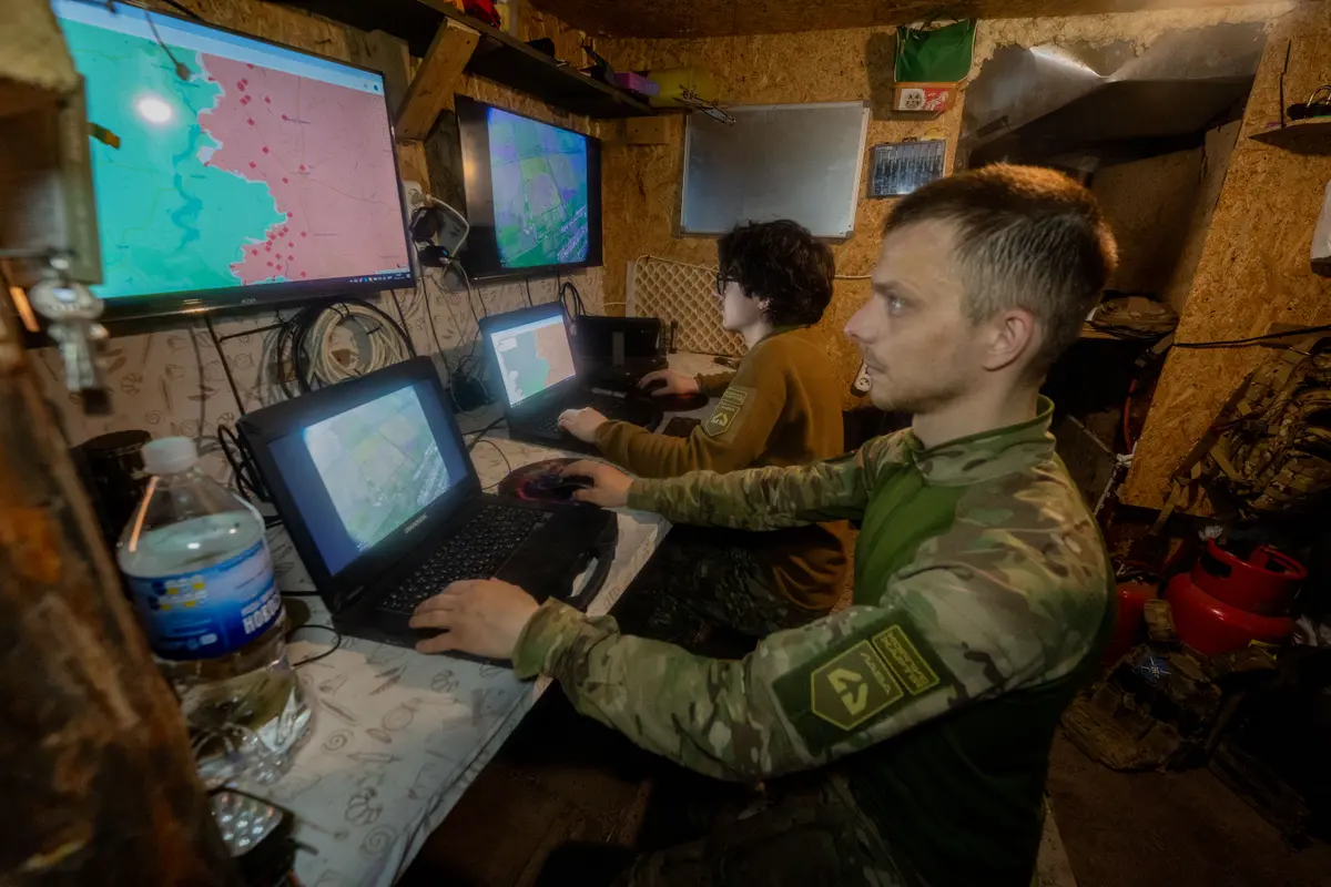 Ukrainian servicemen of the Khartia brigade check a drone’s aerial view in the command center in Kharkiv region, Ukraine, on May 20, 2026. (Andrii Marienko/AP Photo)