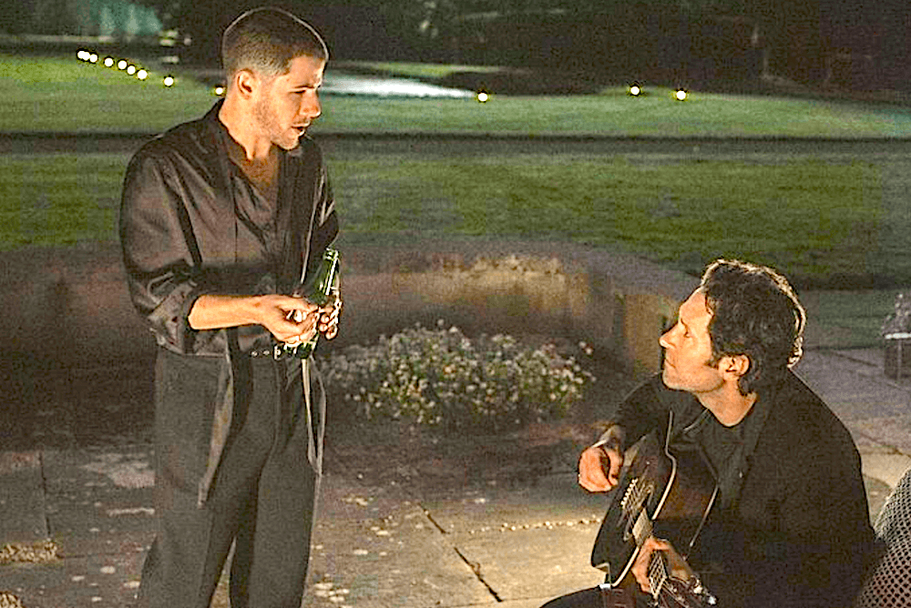Pop star Danny Wilson (Nick Jonas, L) and wedding singer Rick Power (Paul Rudd) play music together, in "Power Ballad." (David Cleary/Lionsgate)