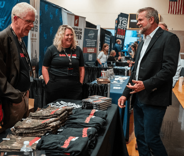 Colorado Republican gubernatorial candidate Victor Marx speaks with voters during the Last Stand Festival in Englewood, Colo., on June 7. (Victor Marx for Governor)