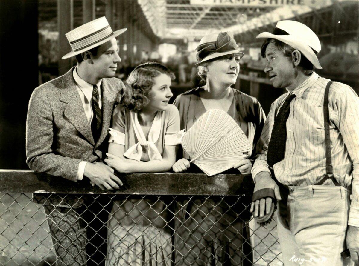 (L–R) The Frake family at the Iowa State Fair: Wayne (Norman Foster), Margy (Janet Gaynor), Melissa (Louise Dresser), and Abel (Will Rogers), in “State Fair.” (Fox Films)