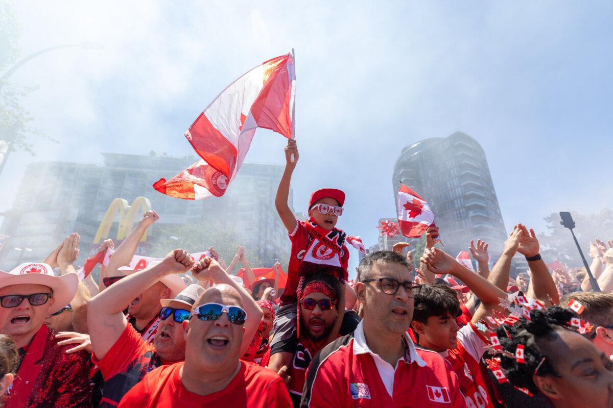 Canada’s Voyageurs parade toward BC Place ahead of Canada’s World Cup Group B soccer match against Qatar, in Vancouver on June 18, 2026. (The Canadian Press/Timothy Matwey)