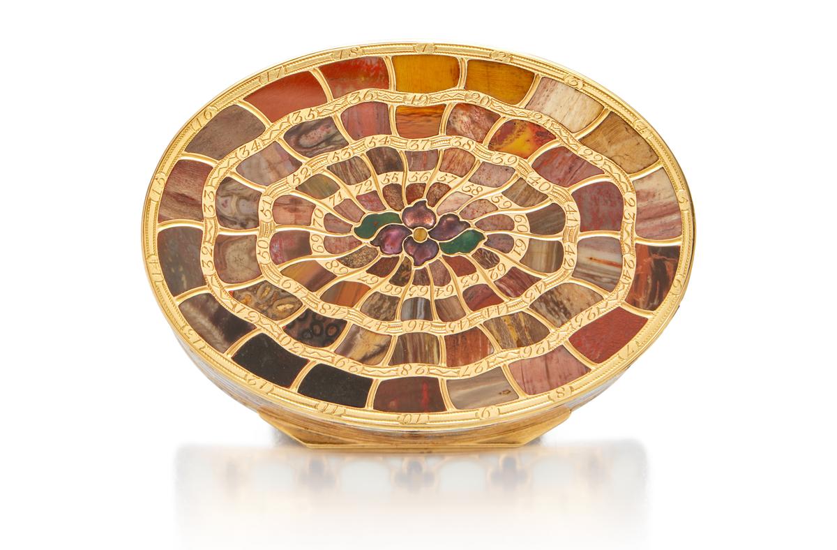 The base of the box features 72 hardstones. (Sotheby's)