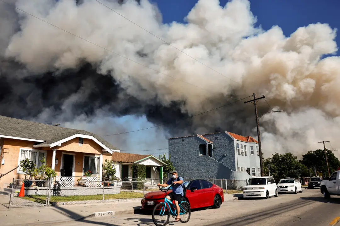 America in Photos: Los Angeles Fire, Beagles Research Facility Closing, and Medal of Honor Ceremony
