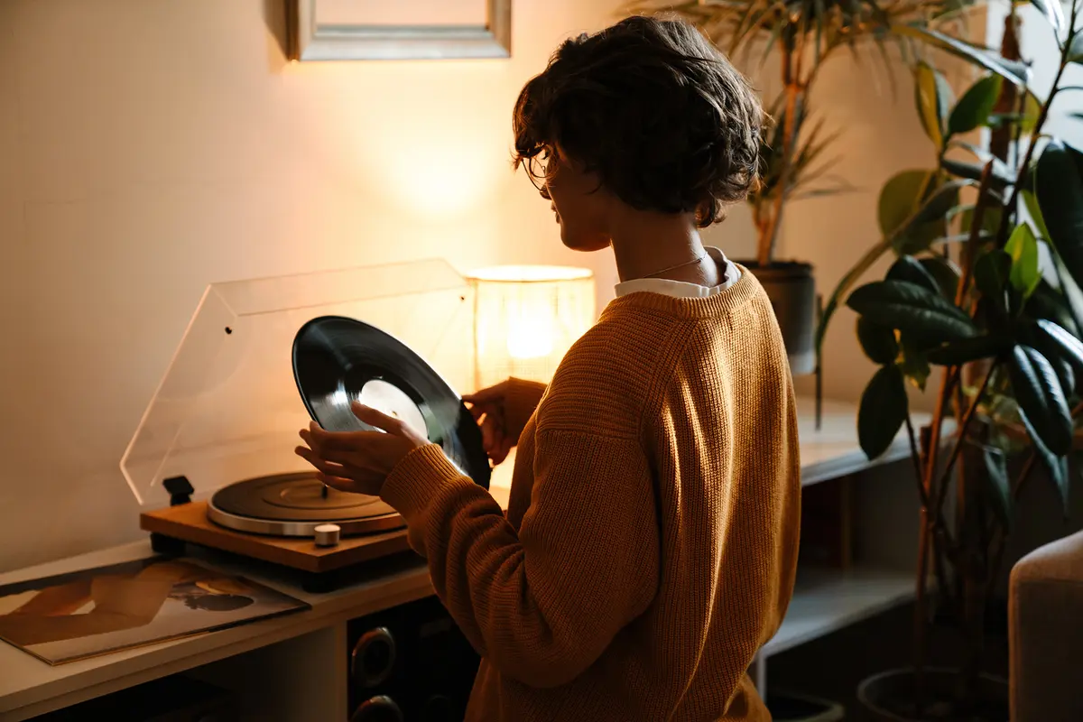 Vinyl records have experienced a sustained revival in recent years, attracting listeners who value a more bodily experience of listening to music. (Dean Drobot/Shutterstock)