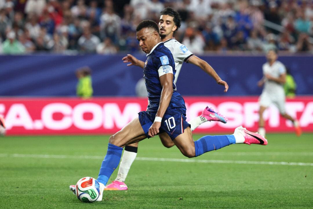 France Advances to Knockout Round With 3–0 Win Over Iraq