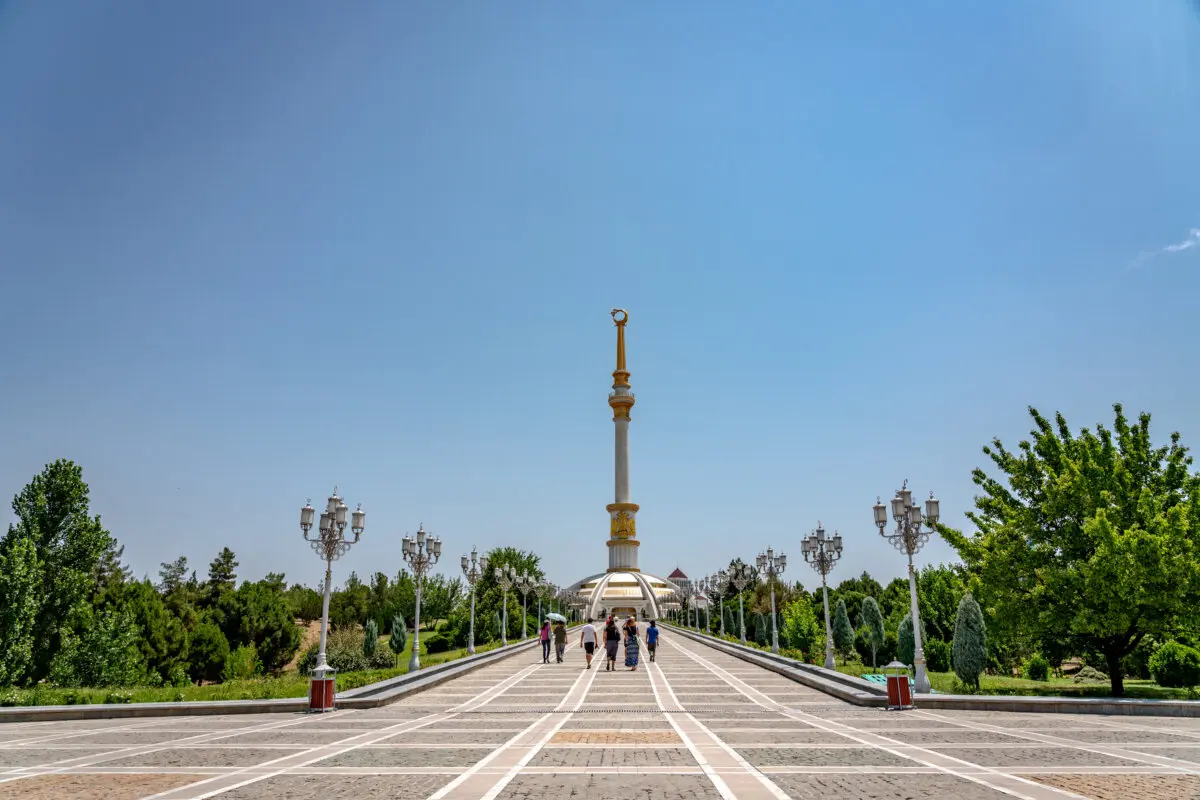 A group of tourists walking in downtown Ashgabat, the capital of Turkmenistan in Central Asia, on July 8, 2019. (Shutterstock/LMspencer)