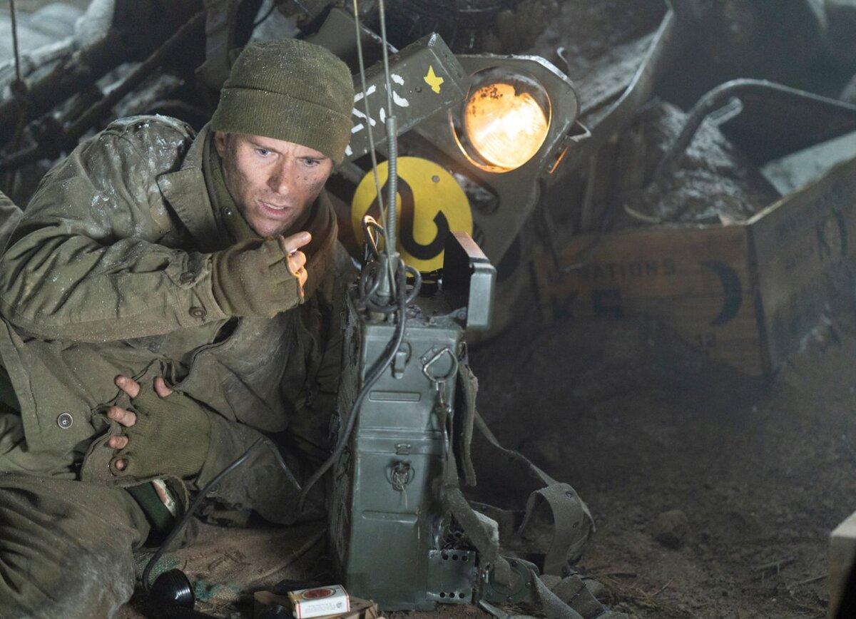 Capt. Castle (Scott Eastwood) and his walkie-talkie, in "Lucky Strike." (Roadside Attractions)