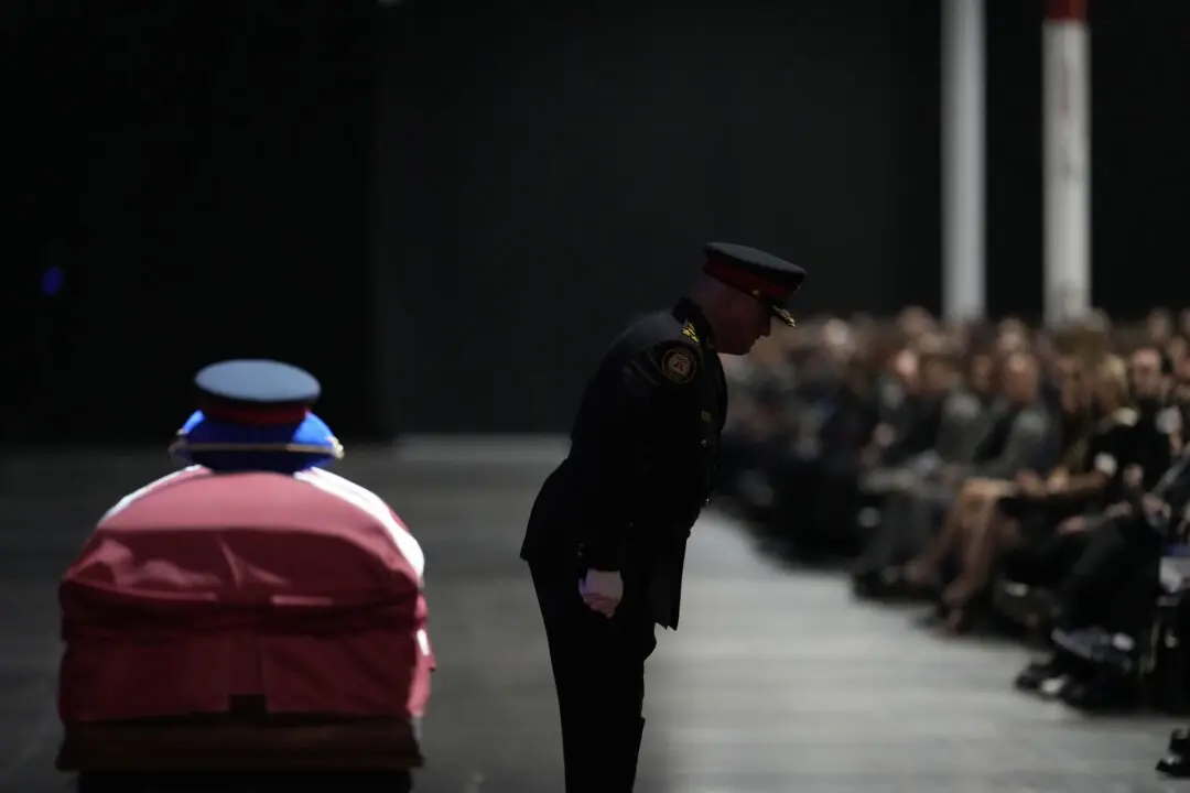 Toronto Officer Killed During Police Raid Was ‘Loved by Everyone,’ Mourners Told