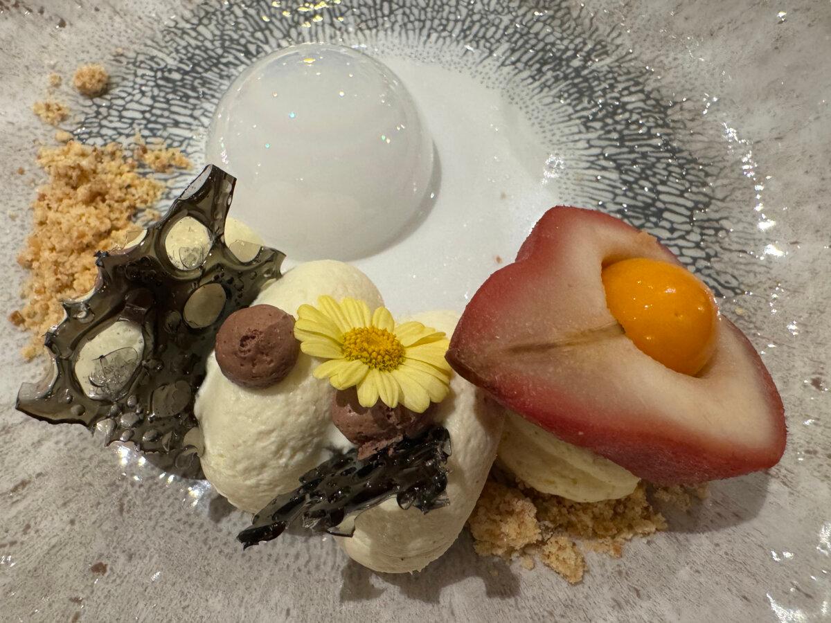 The ship pastry chef's elevated take on a classic French poached pear dessert, poire belle-Helene. (Lori Rackl/TNS)
