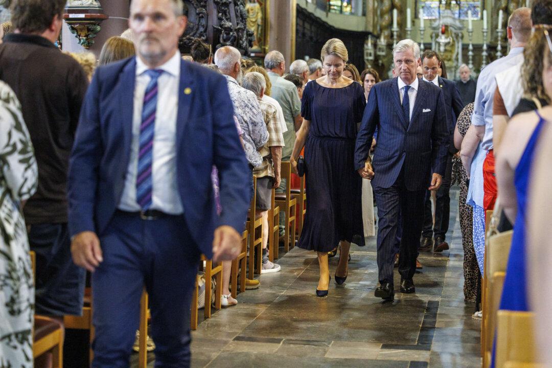 Queen Mathilde of Belgium and King Philippe - Filip of Belgium pictured during a commemorative ceremony in honour of the victims of last May accident between a train and a minivan, at the railway crossing Vierhuizen, in Buggenhout, Tuesday 26 May 2026. On May 26th, four people died in the traffic accident: two pupils, the driver and a supervisor. BELGA PHOTO NICOLAS MAETERLINCK (Photo by NICOLAS MAETERLINCK / BELGA MAG / Belga / AFP via Getty Images)