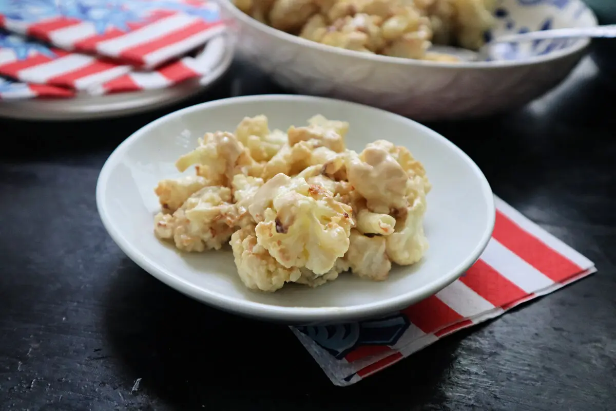 Roasted cauliflower tossed in a tangy tahini dressing. (Gretchen McKay/Pittsburgh Post-Gazette/TNS)