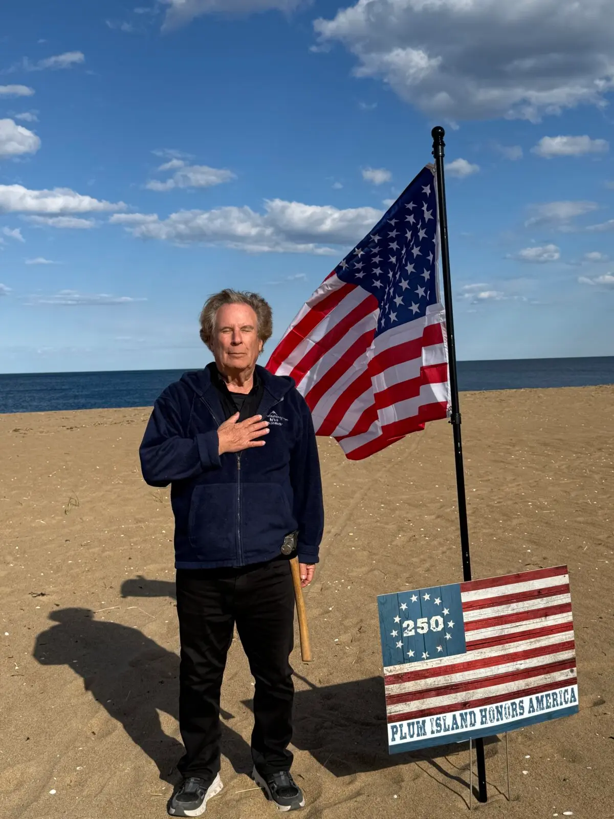 Marc Sarkady, a Plum Island, Mass., resident, said he put up the American flags to celebrate the nation’s 250th birthday but was threatened they violated state environmental laws. (Courtesy of Marc Sarkady)