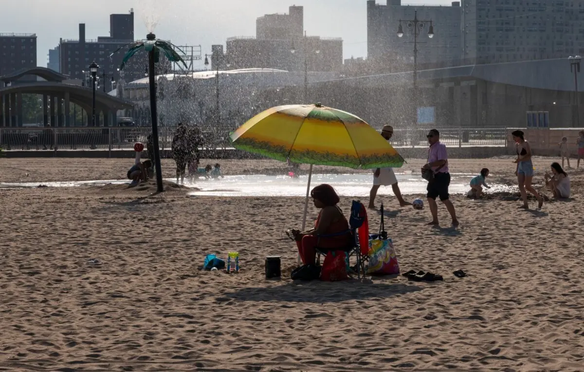 People cool off at Coney Island beach in the Brooklyn borough of New York City on June 29, 2026. (Spencer Platt/Getty Images)