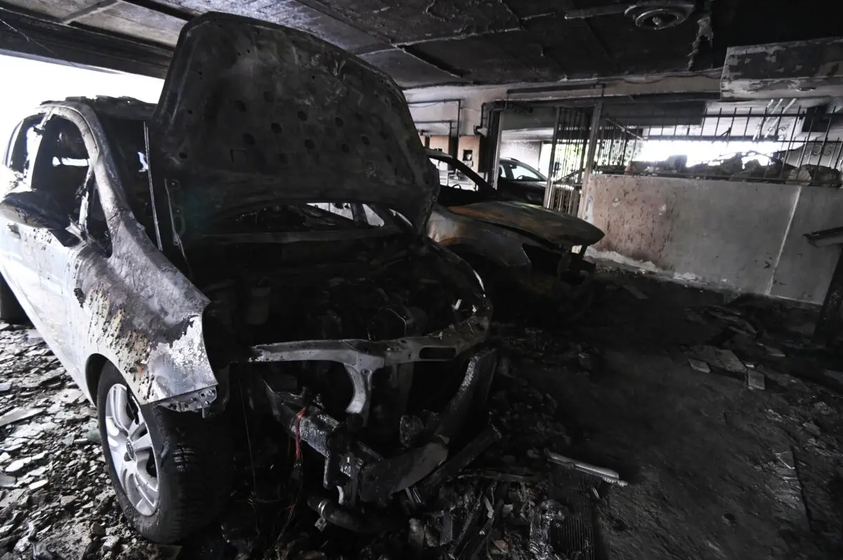 Burned vehicles are seen following firebomb attacks that apparently targeted members of Greece's governing conservative New Democracy party in the northern port city of Thessaloniki, Greece, on July 1, 2026. (Giannis Papanikos/AP)