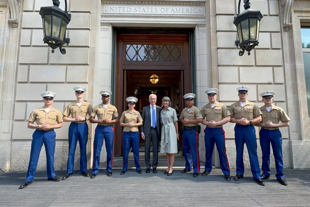 U.S. Ambassador to France Charles Kushner and his wife, Seryl Kushner, at the U.S. Embassy in Paris, alongside Marines from the Marine Security Unit at Mission Paris. (Courtesy of the U.S. Embassy to France)