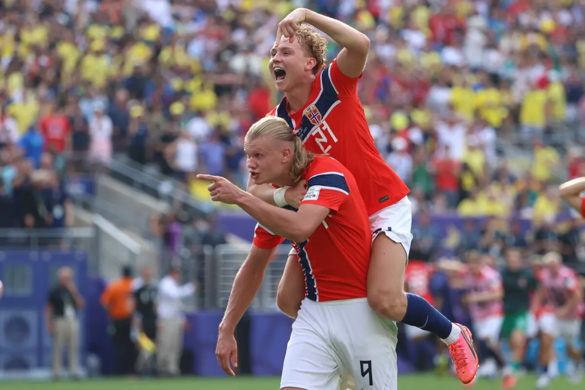 Norway's Erling Haaland (#9) celebrates with Andreas Schjelderup (#21) after scoring the team's second goal during a Round of 16 match against Brazil in East Rutherford, N.J., on July 5, 2026. (Pamela Smith/AP Photo)
