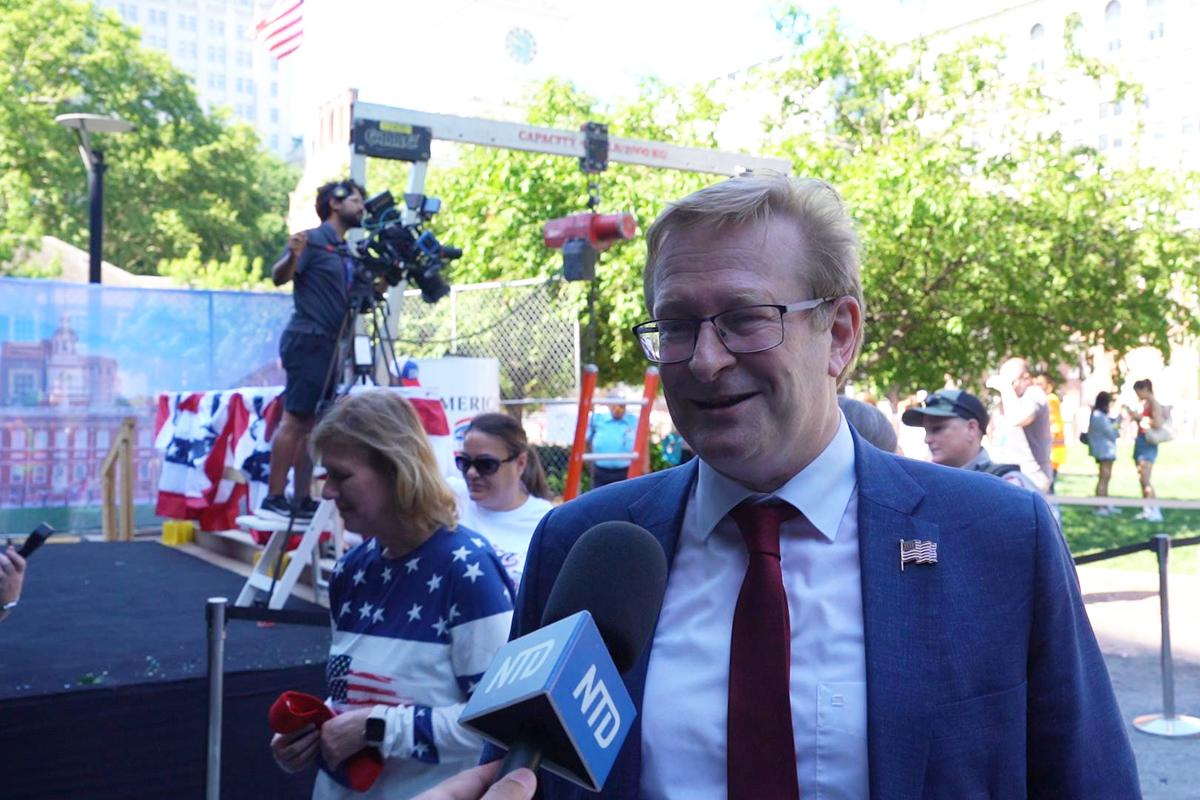 Thomas Schulze, a German American psychiatrist and professor, attended the ceremony burying the United States’ Semiquincentennial time capsule held on the lawn at Independence Hall on July 4, 2026. (William Huang /The Epoch Times)