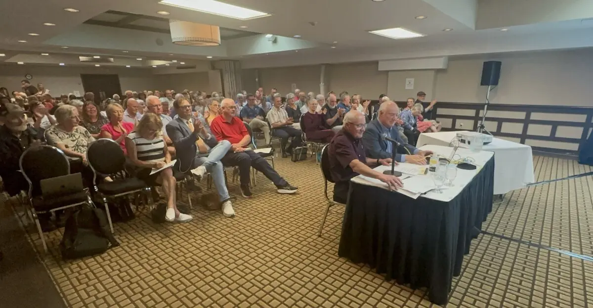 Wayne Easter, a former PEI Liberal MP and former Solicitor General of Canada (L), and Jan Matejcek, co-founder of Save PEI, give a presentation at a public hearing of the Review of the Island Regulatory and Appeals Commission in Charlottetown on July 6, 2026. (Omid Ghoreishi/The Epoch Times)