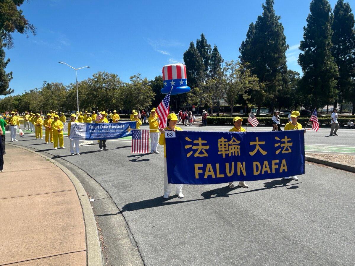 Practitioners of Falun Gong (also called Falun Dafa) participate in a parade in Fremont, Calif., on July 4, 2026, celebrating the 250th anniversary of the founding of the United States. (Nathan Su/The Epoch Times)
