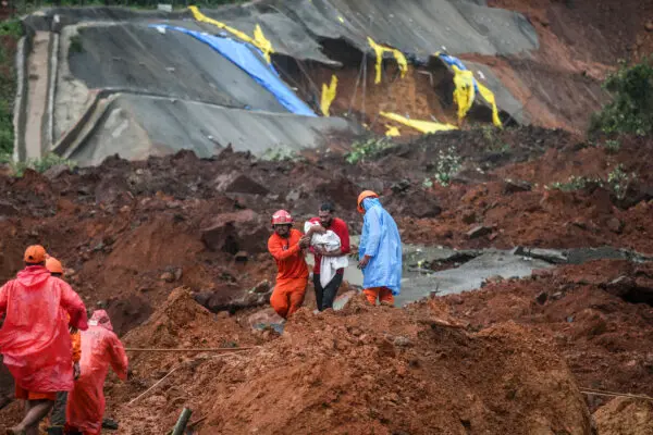 Day in Photos: Tunnel Collapse Rescue, NATO Summit, and Paris Fashion Week