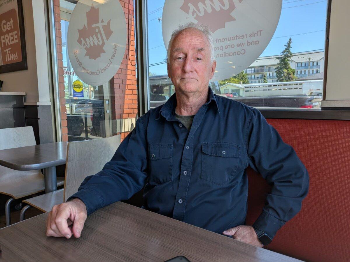 Olds resident Geoff Davidson says the proposed AI data centre campus poses serious environmental, health, safety, and quality-of-life concerns. (Paul Rowan Brian/The Epoch Times)