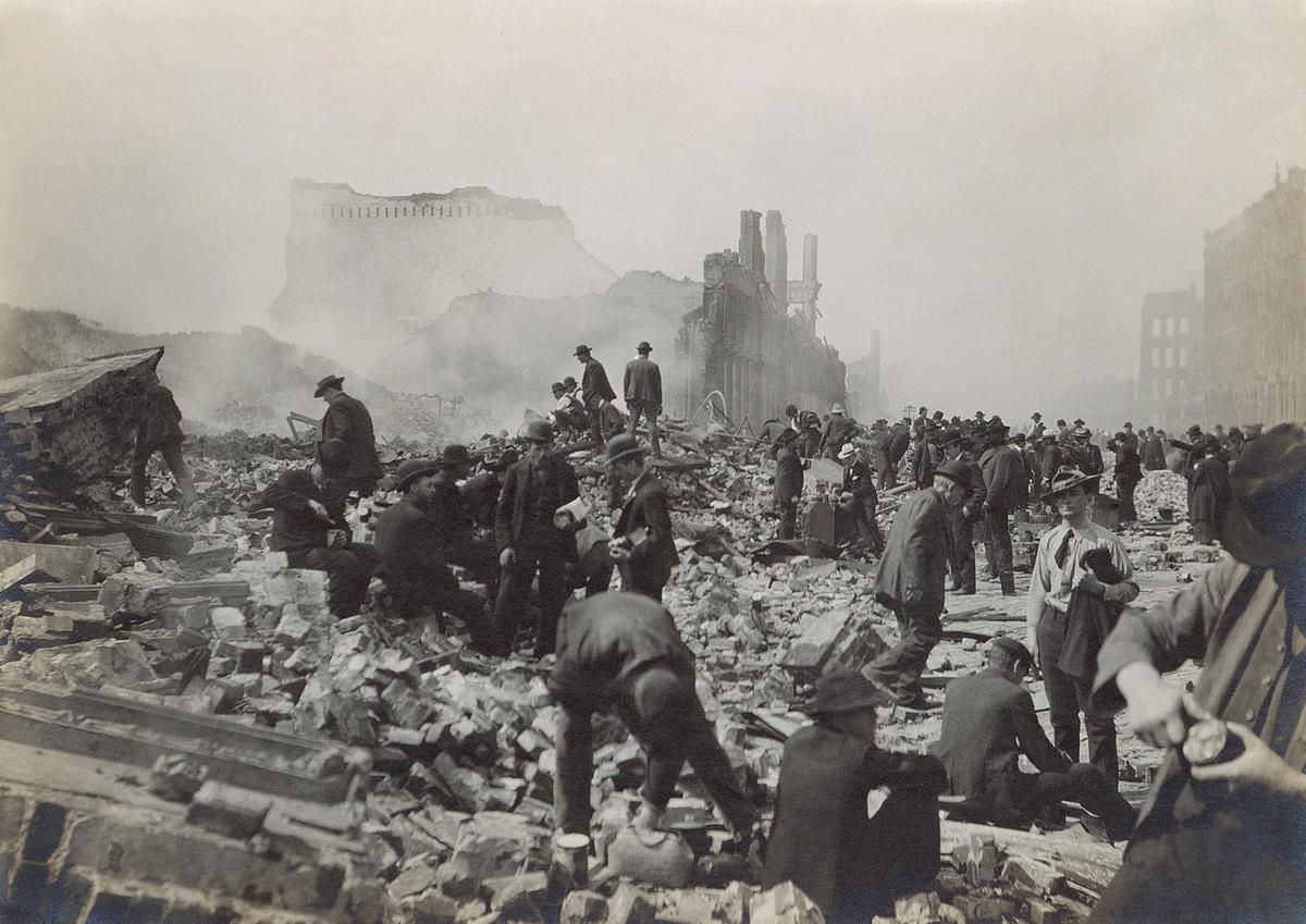 The 1906 San Francisco earthquake triggered widespread structural collapse and fires across the city. The streets were filled with rubble and debris, with buildings reduced to skeletal remains or piles of wood and stone. (Everett Collection/Shutterstock)