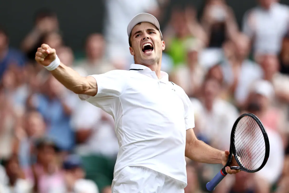 Arthur Fery of Great Britain celebrates after winning the fourth set against Grigor Dimitrov of Bulgaria during their men's singles fourth-round match at Wimbledon in London on July 6, 2026. (James Fearn/Getty Images)