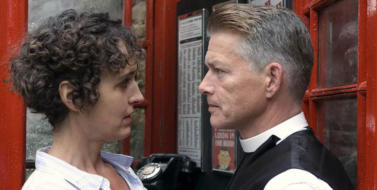 Anna Simpson (Anne Scherliess) and Reverend Charles Wilson (Richard Dee-Roberts), in “The Reverend and Mrs Simpson.” (GJW+)