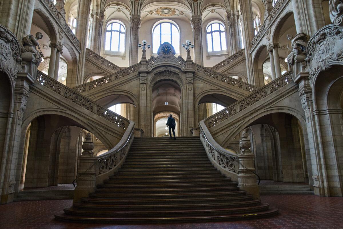 A man walks in the court on the day of the trial against an online predator network of men accused of using chat groups to share tips on how to drug and rape women, in Berlin, Germany on July 8, 2026. (Ebrahim Noroozi/AP Photo)