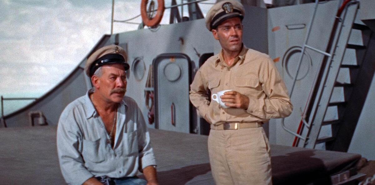 Dowdy (Ward Bond, L) and Lt. Roberts (Henry Fonda), in “Mister Roberts.” (Warner Bros.)