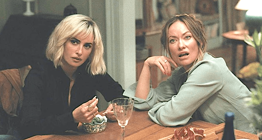 Piña (Penélope Cruz, L) and Angela (Olivia Wilde) side with each other against their respective spouses, in "The Invite." (Annapurna Pictures/A24)