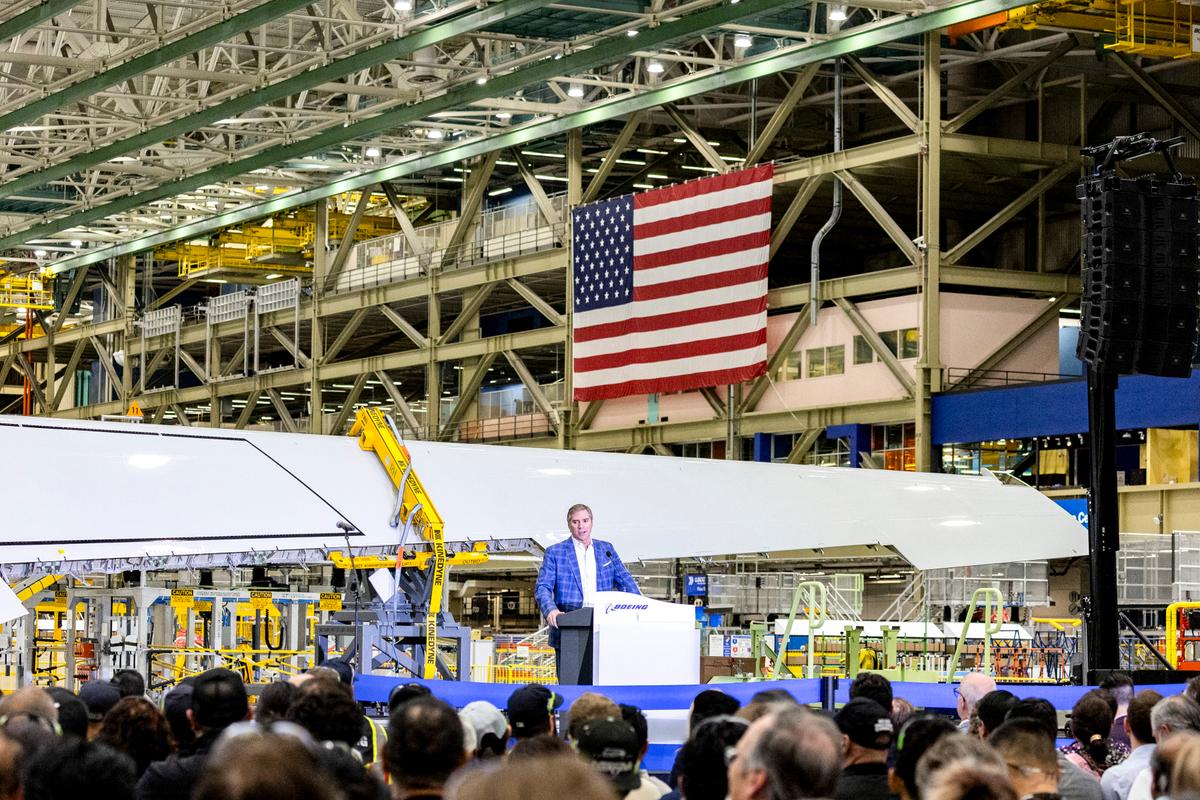 Mike Fleming, senior vice president of Airplane Programs and Customer Service of Boeing Commercial Airplanes, speaks during the opening of the company's new North Line assembly line, which will produce the 737 MAX aircraft, at the Boeing Everett Factory in Everett, Washington, on July 10, 2026. (Jason Redmond / AFP via Getty Images)