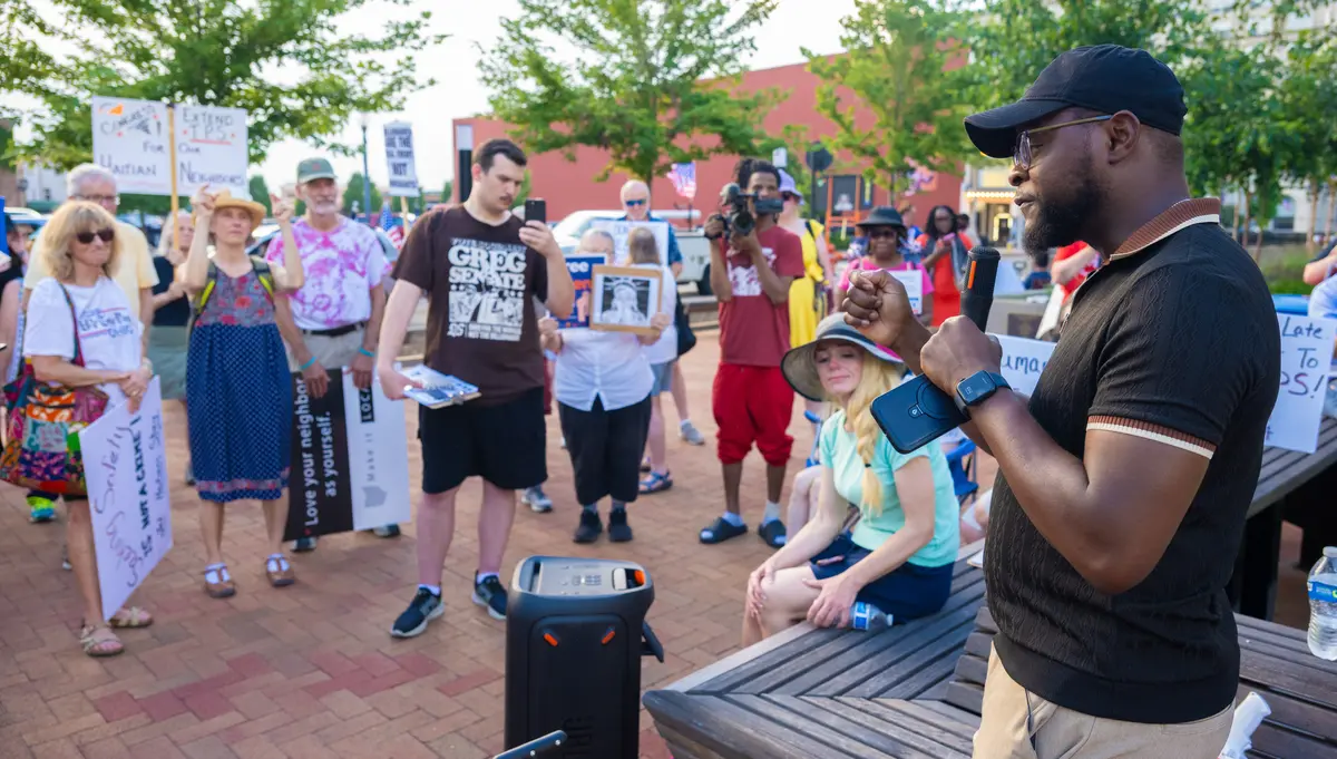 Viles Dorsainvil, executive director of the Haitian Community Help and Support Center, addresses pro-Haitian demonstrators at the Springfield, Ohio, City Hall on July 3, 2026. (Glenn Hartong for The Epoch Times)
