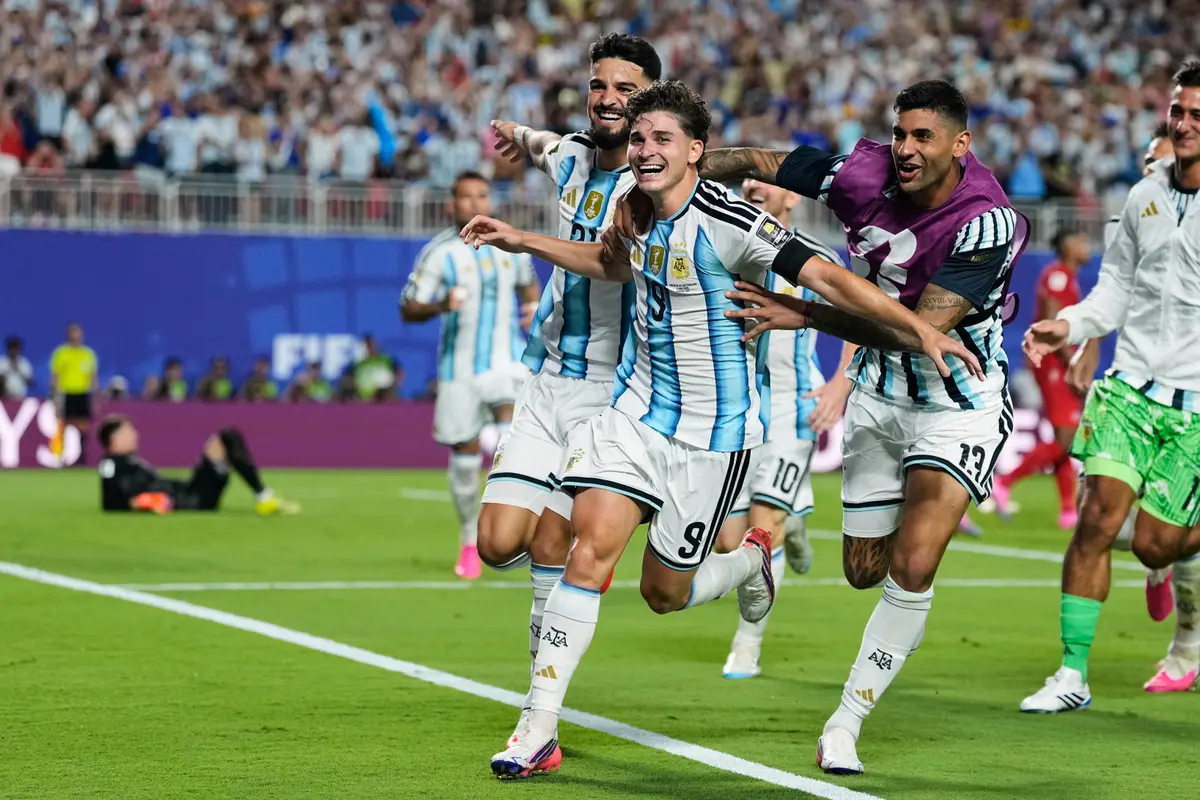 Argentina's Julián Alvarez (9) celebrates after scoring his side's second goal during the World Cup quarterfinal soccer match against Switzerland in Kansas City, Mo., on July 11, 2026. (AP Photo/Charlie Riedel)