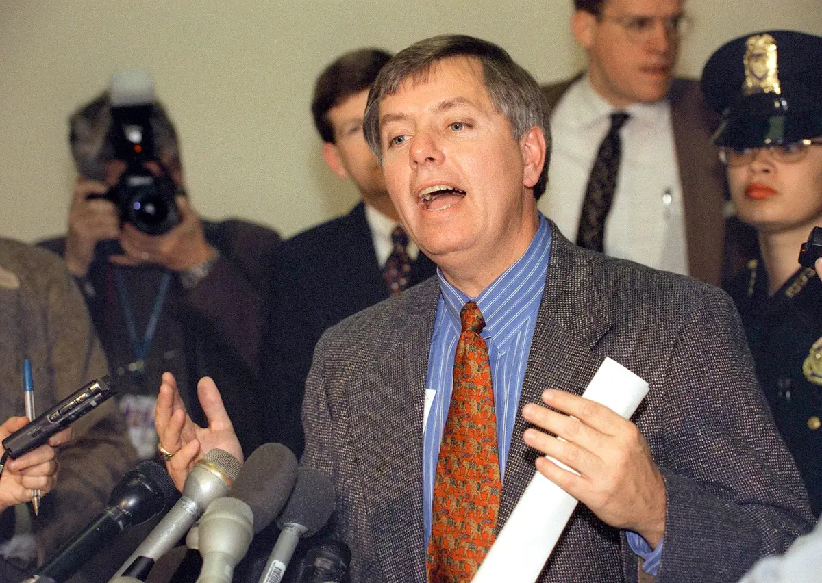 US Rep. and member of the House Judiciary Committee Lindsey Graham, R-S.C., talks to reporters after a meeting of the "House Mangers" at the US Capitol on Dec. 29, 1998. (Tim Sloan/AFP via Getty Images)
