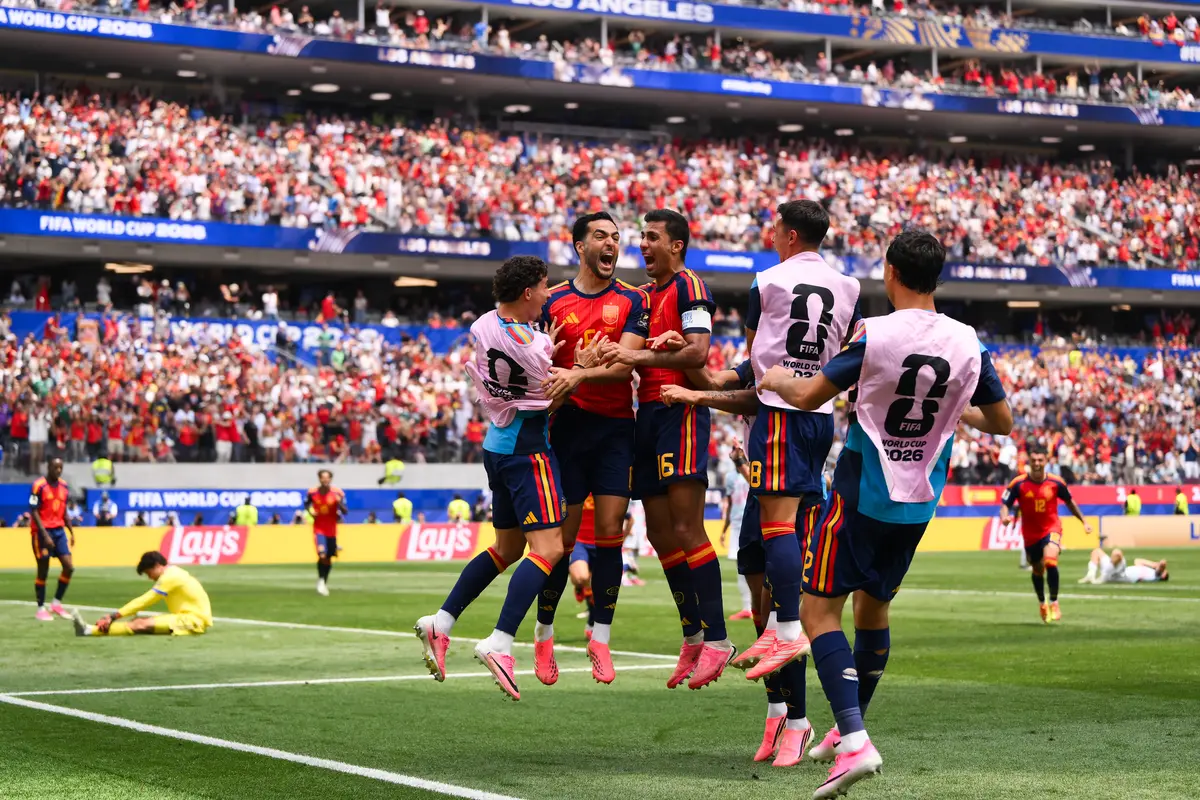 Mikel Merino #6 of Spain celebrates with his teammates after scoring his team's second goal during the FIFA World Cup 2026 quarterfinal match against Belgium at Los Angeles Stadium on July 10, 2026. (David Ramos/Getty Images)