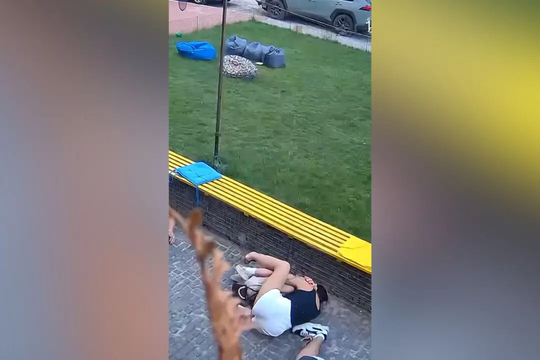 Woman Protects Child From Russian Strikes in Ukraine’s Sumy