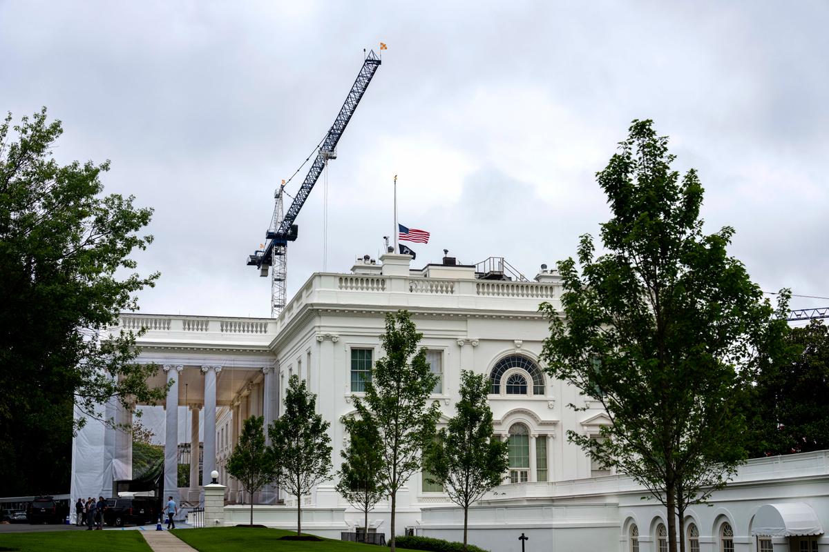 The American flag flies at half-staff above the White House, following the death of Sen. Lindsey Graham (R-S.C.), on July 12, 2026. (Al Drago/Getty Images)