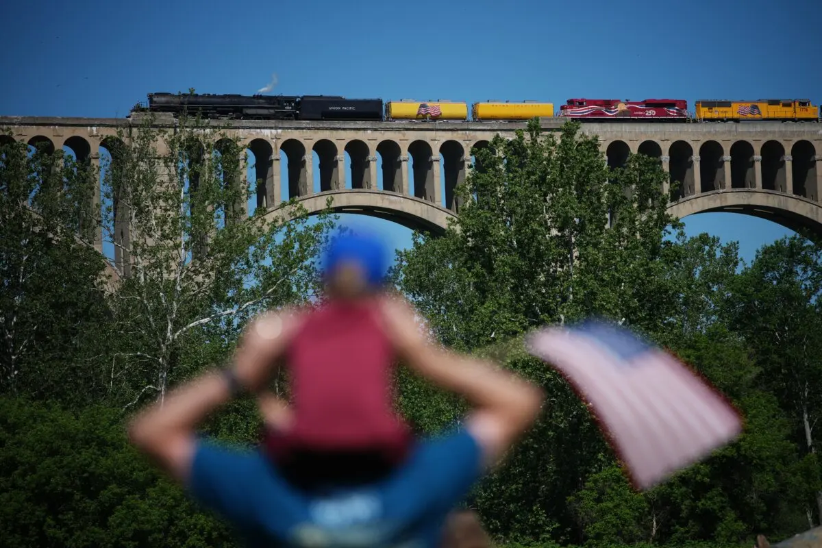 People gather to see the Union Pacific “Big Boy” No. 4014 steam locomotive, on the Tunkhannock Creek Viaduct in Nicholson, Pa., on June 13, 2026, as part of a coast-to-coast tour to celebrate America's 250th anniversary. (AP Photo/Matt Rourke)