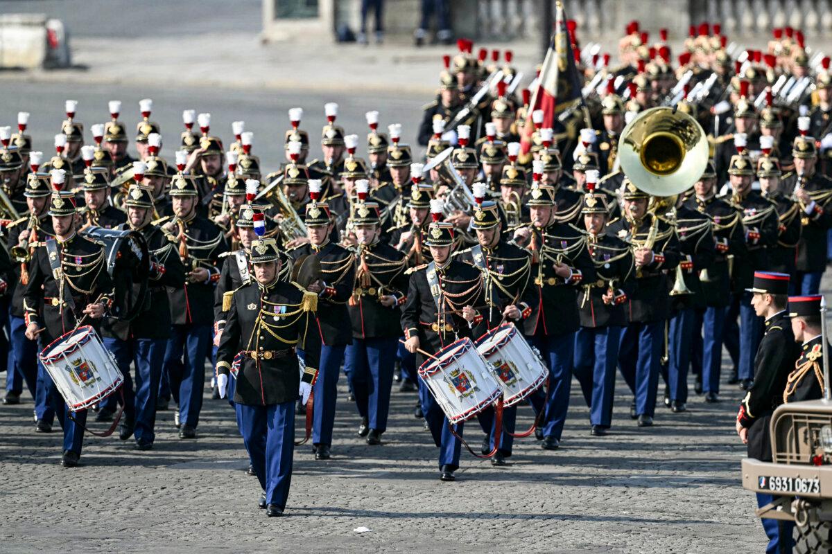 France's Republican Guard Band parades ahead of the annual Bastille Day military parade on the Champs-Élysées Avenue in Paris, on July 14, 2026. (Lou Benoist / AFP via Getty Images)