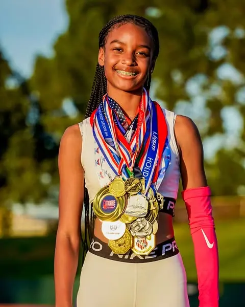 Janet Criss with medals she won. (Courtesy of Stephanie Burton)