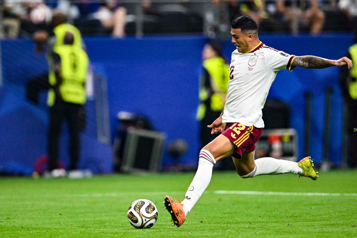 Spain defender Pedro Porro shoots to score his team's second goal during the 2026 World Cup football tournament semifinal against France at the Dallas Stadium in Arlington on July 14, 2026. (Mauro Pimentel / AFP via Getty Images)