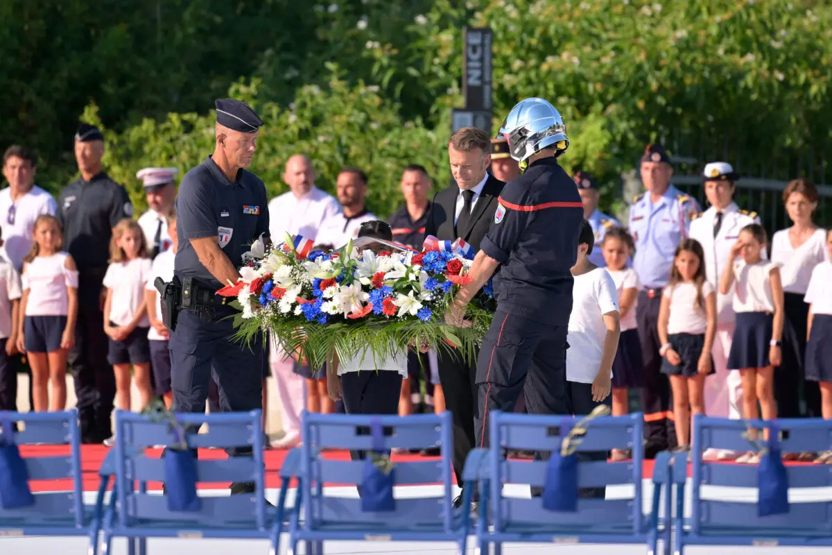 France's President Emmanuel Macron lays a wreath during a ceremony marking the 10th anniversary of an attack that killed 86 people and injured more than 400 in Nice, on the French riviera city of Nice on July 14, 2026. (Philippe Magoni/POOL/AFP via Getty Images)