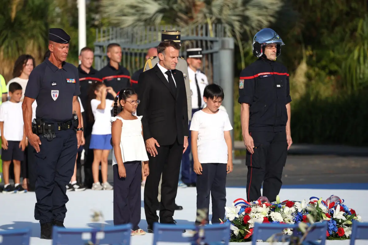 France's President Emmanuel Macron (C) attends a ceremony marking the 10th anniversary of an attack that killed 86 people and injured more than 400 in Nice, on the French riviera city of Nice on July 14, 2026. (Valery Hache/AFP via Getty Images)